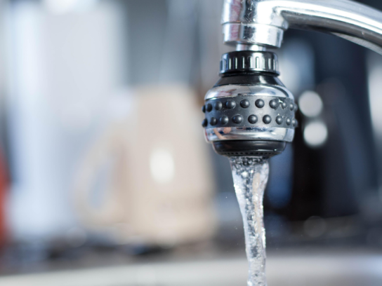 photo of water running from faucet or tap